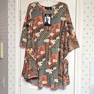Brand New Attitudes by Renee Longer Tunic. 3/4 Sleeves. V-neck. Size Medium/Lg